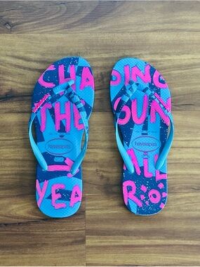 Havaianas Teal Flip Flops with Hot Pink Graphic